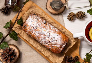 Top view of a rectangular cupcake with powdered sugar