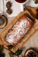 Top view of a rectangular cupcake with powdered sugar
