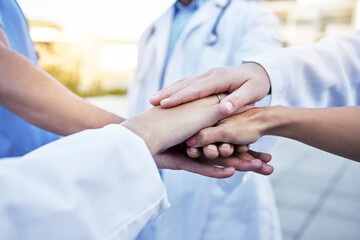 Healthcare, solidarity and hands of doctors for support, partnership and medical success. Teamwork,...