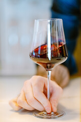 Red wine swirling in glass 