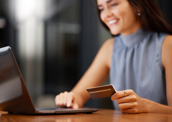 Fototapeta premium Credit card, business woman and computer online payment of a employee doing online shopping. Ecommerce, technology and digital banking of a young person typing bank information on store website