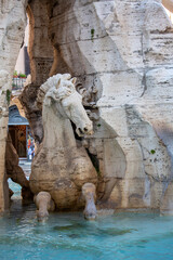 Fototapeta na wymiar 17th century Fountain of the Four Rivers located in Piazza Navona, Rome, Italy