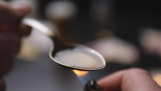 addict preparing dose of crack 4k slow motion