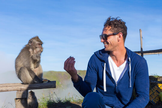 Young man and monkey
