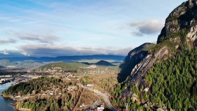 Aerial View Of Sea to Sky Highway With Paraglider Near Stawamus Chief In Squamish, British Columbia, Canada.