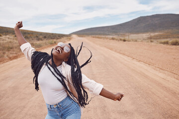 Freedom, excitement and mockup with a black woman dancing in the desert for fun during a road trip....