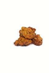Masoor Dal Pakoda or Red Lentil Vada on Isolated on White Background in Vertical Orientation