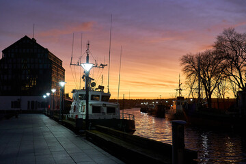 Sunset on the pier in the historical part of the old town