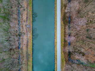 Winter scene around the canal Dessel Schoten aerial photo in Rijkevorsel, kempen, Belgium, showing the waterway in the natural green agricultural landscape. High quality photo. High quality photo