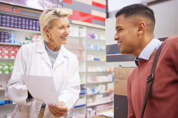 Obraz premium Pharmacy, insurance document and male customer with pharmacist talking about pills side effects. Reading, prescription info and healthcare worker with consulting for health and wellness check