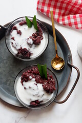 Bubur Ketan Hitam, Indonesian dessert. Black glutinous rice porridge with coconut milk, palm sugar and pandan leaf. 