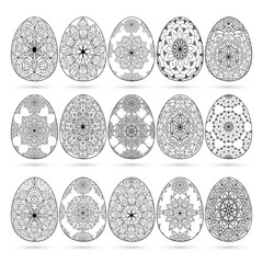 Hand drawn Easter collection of ornamental eggs with patterns, mandala, flowers, leaves. Spring outline floral egg on white background. Abstract vector set illustration for greeting card, invitation