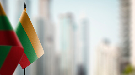 A small Lithuania flag on an abstract blurry background