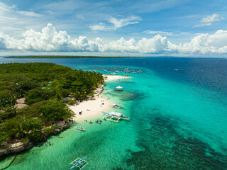 Fototapeta na wymiar Beautiful beach in the blue lagoon. Virgin Island, Philippines.