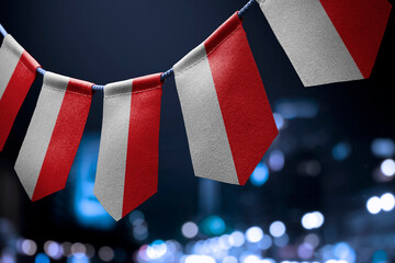 A garland of Indonesia national flags on an abstract blurred background