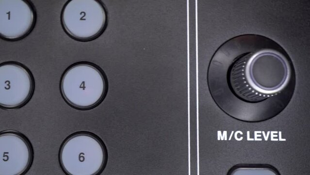 Professional digital audio mixer. Control panel on the digital macro remote control. The camera makes a slide.