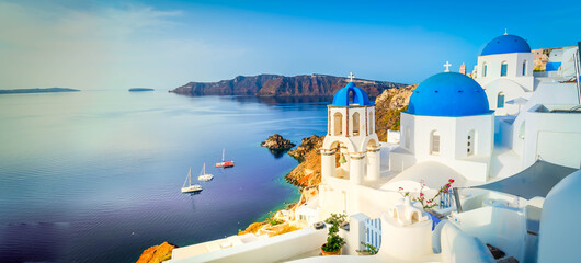 white belfries Santorini island, Greece - obrazy, fototapety, plakaty