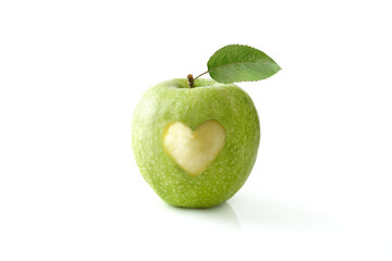 Apple eaten in the center with heart shape isolated background