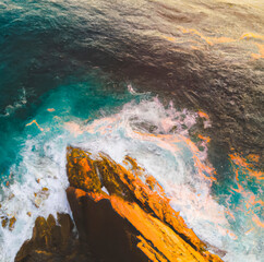 Aerial view of beautiful sunset on sea coastline. - 572599809