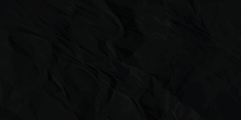 Black paper texture . Dark black wrinkled paper texture. Black crumpled paper texture . black crumpled and top view textures can be used for background of text or any contents .