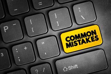 Fototapeta premium Common Mistakes text button on keyboard, concept background