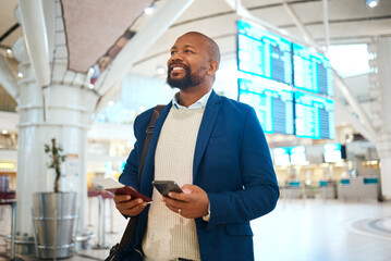 Black man with phone, ticket and passport at airport checking flight schedule online and walking in...