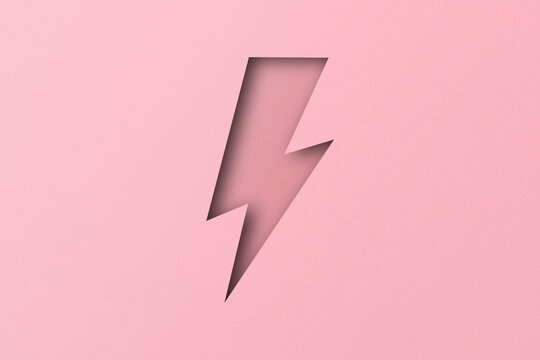 pink paper cut holes Lightning bolts are overlaid with light and shadow.