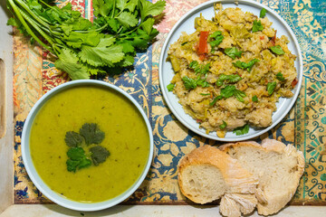 Courgette and coriander soup with tomato migas.