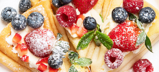 Healthy breakfast, homemade traditional crepes or pancakes