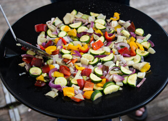 bowl with various fresh vegetables in different colors