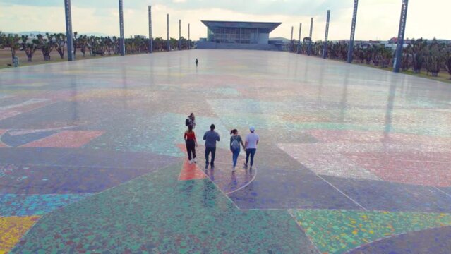 Soar above the tribute to women in Pachuca. Showcasing the celebration from a bird's eye view, capturing the vibrant atmosphere and beauty of this special event. Perfect for stock video projects.