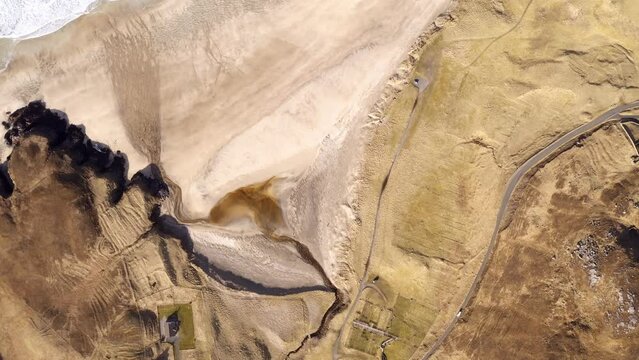 Birds-eye-view drone shot of the beach in Uig, Isle of Lewis on the Outer Hebrides of Scotland.
