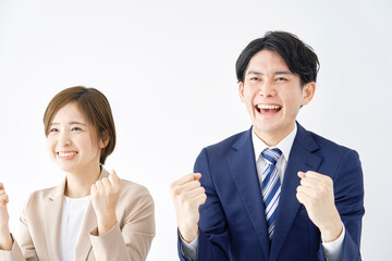 ガッツポーズするビジネスウーマンとビジネスマン　白背景