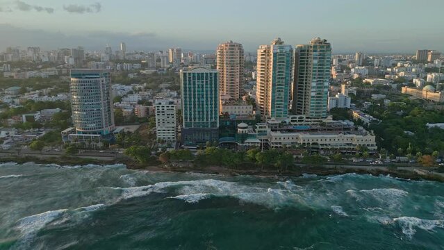 Extraordinary view of the Santo Domingo boardwalk at the end of the afternoon, aerial shot with drone