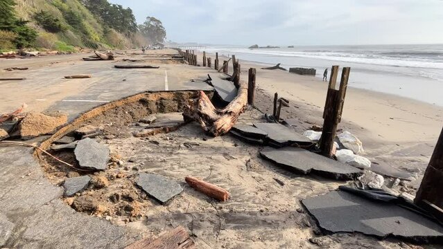 Debris At Extremely Damaged Parking Lot On The Coast Of Seacliff State Beach Caused By Heavy Storm In California, USA. static