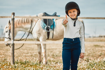 .Happy, thumbs up and horse with portrait of girl in countryside for approval, equestrian and...