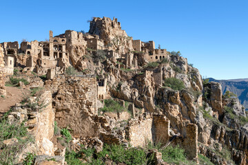 Sunny September morning on the ruins of the abandoned mountain village of Gamsutl. Republic of Dagestan, Russian Federation