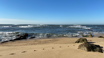 Fototapeta na wymiar rocky beach by the ocean in Portugal