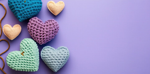 Many colorful crocheted hearts on purple background. Generative AI