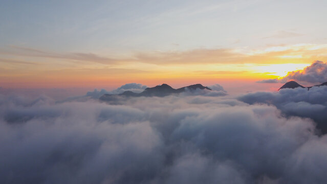 aerial photo above the clouds view of the sky at dusk