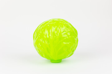 white duckling young cabbage plastic toy on a white background