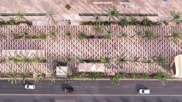 Alicante Esplanade Promenade, Spain. Top Down Aerial View of Mosaic Pavement and Road Traffic, High Angle Drone Shot