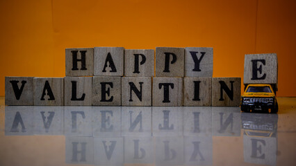 minahasa, Indonesia : January 2023, Happy valentine's day from stacked wooden blocks
