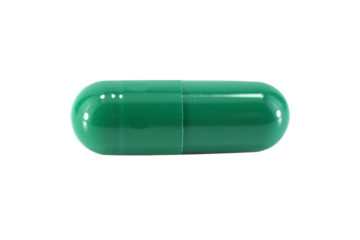 green capsule pills isolated on white background.