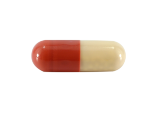 One colorful capsule isolated on white background.