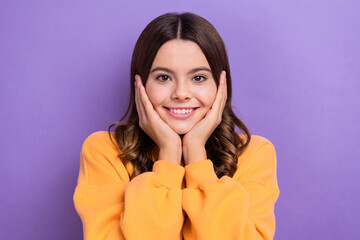 Photo of positive glad lady wear comfort orange clothes arm under chin touch cheeks enjoy holiday...