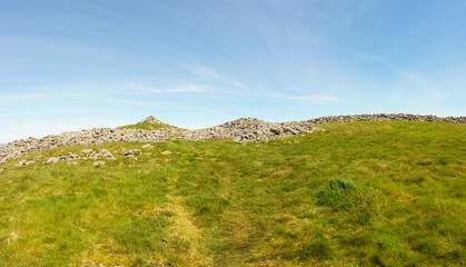Fototapeta na wymiar Caer Drewyn an iron age hill fort with dry stone ramparts to the north of Corwen North Wales dated to 500 BC it was also reputed to be where Owain Glyndŵr is believed to have based his army in 1400