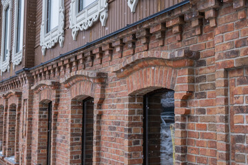 Carved window frames of the historic building after reconstruction