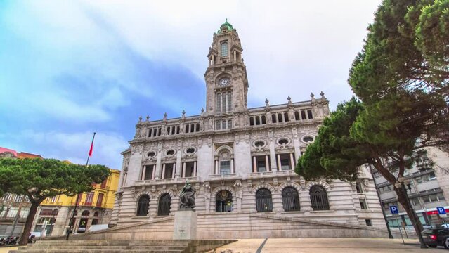 City Hall building timelapse hyperlapse Camara Municipal do Porto on Liberdade Square with monument, Porto, Portugal. Facade view with a monument in front of it