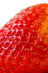 Strawberries close-up on a white background. Strawberries isolated. Juicy fresh berry macro photography
